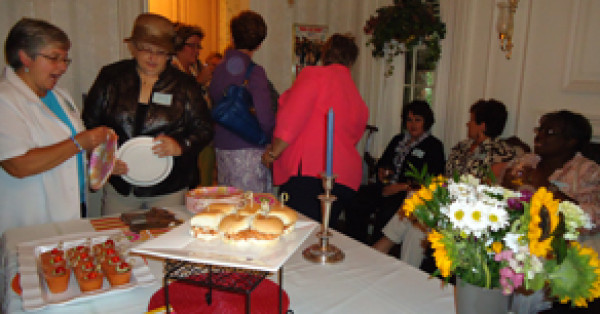 NEONI Members Welcome New Staff at Summer Soirée
